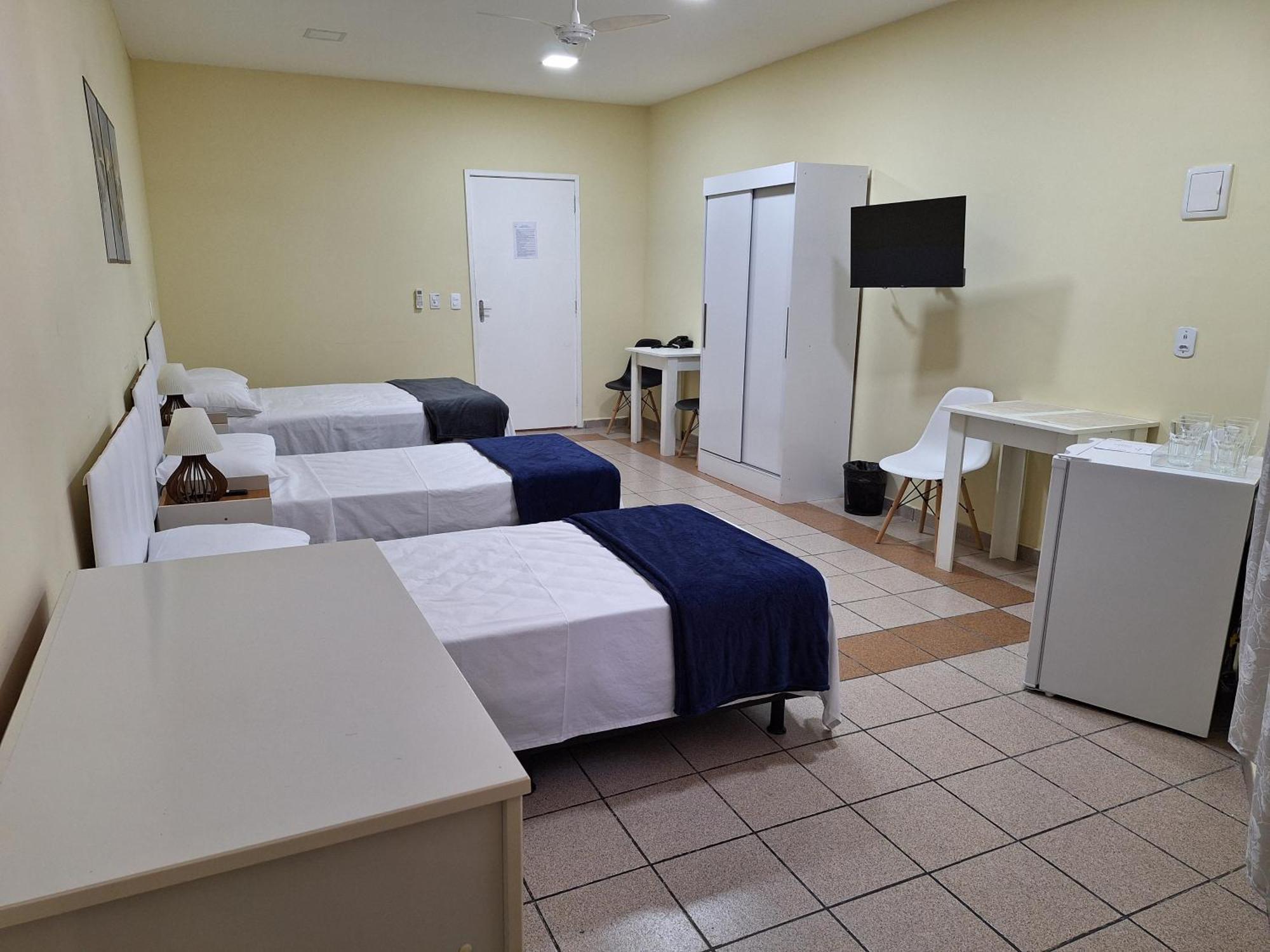Quarto Quádruplo com Banheiro Privativo